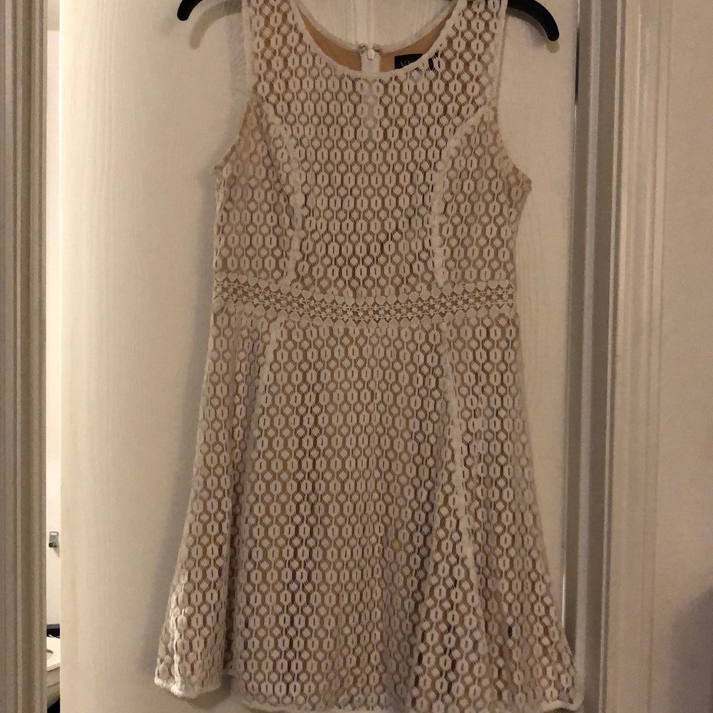Venus cream-colored skater dress 👗.